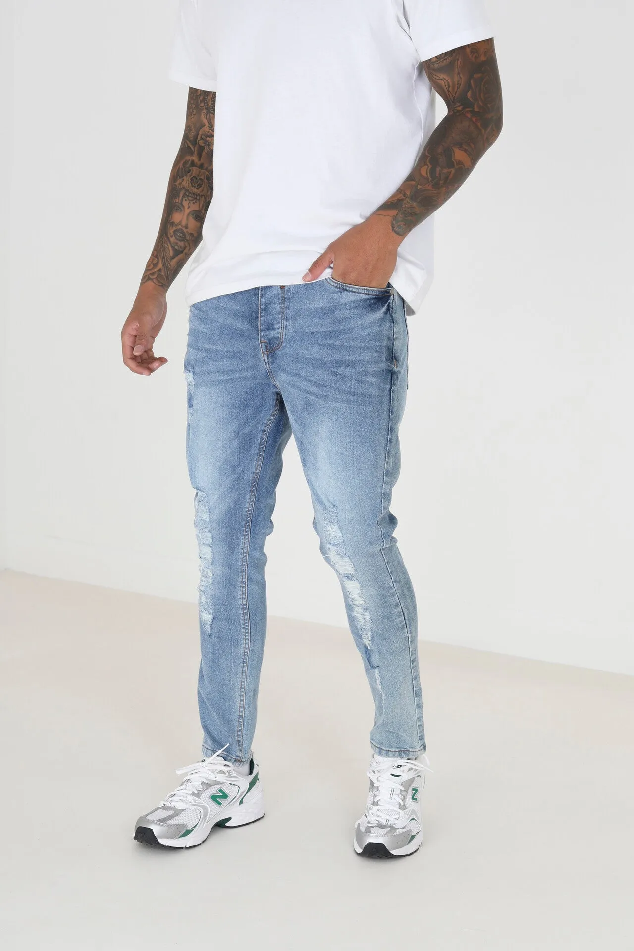 BLEACHED BLUE DENIM RIPPED SKINNY JEANS