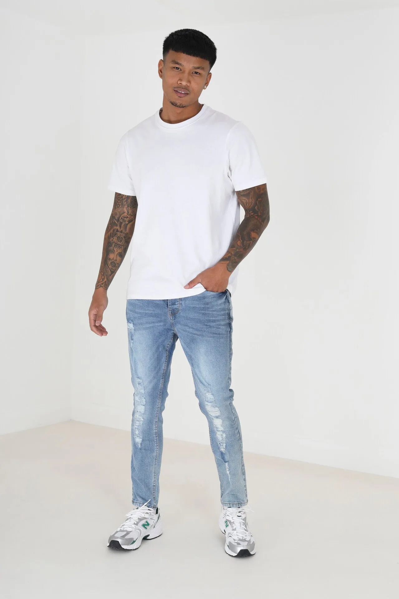 BLEACHED BLUE DENIM RIPPED SKINNY JEANS