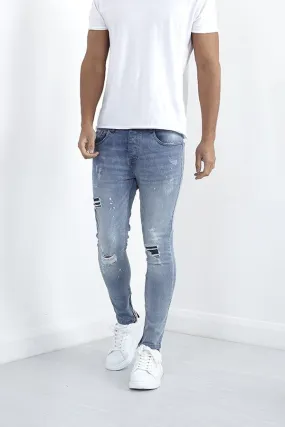 LIGHT BLUE SKINNY FIT ZIP DETAIL RIPPD DENIM JEANS