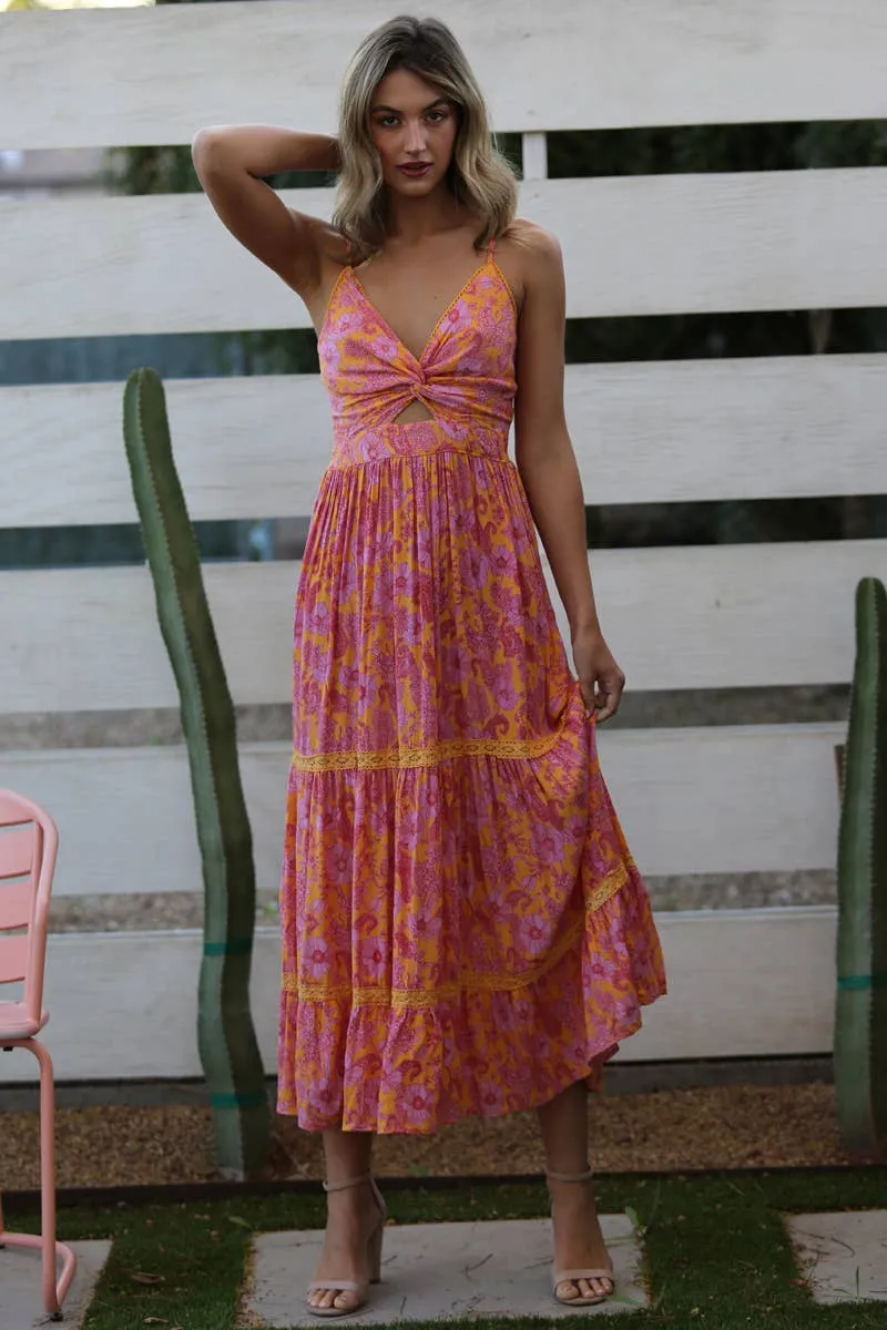 V-neck twist maxi dress with a lace tiered skirt and cut out detail